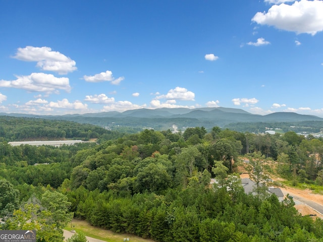 mountain view featuring a view of trees