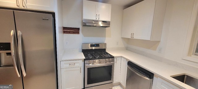 507 Augusta Dr SE, Marietta, GA 30067 - kitchen with white cabinetry, sink, and appliances with stainless steel finishes