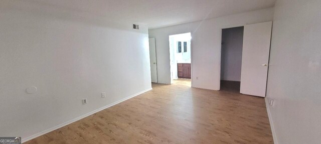 507 Augusta Dr SE, Marietta, GA 30067 - empty room with wood-type flooring