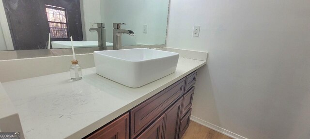 507 Augusta Dr SE, Marietta, GA 30067 - bathroom featuring vanity and wood-type flooring
