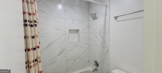 507 Augusta Dr SE, Marietta, GA 30067 - bathroom featuring toilet and shower / bath combo with shower curtain
