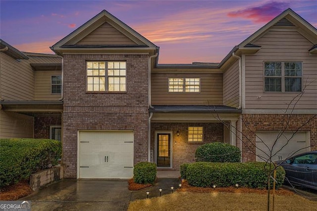 view of front of home with a garage