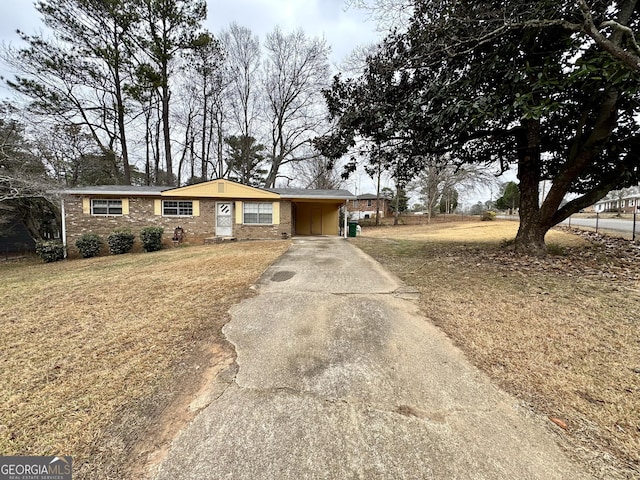 ranch-style home with a front lawn and a carport