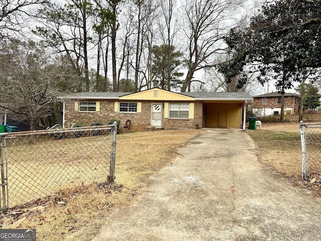 single story home featuring a carport