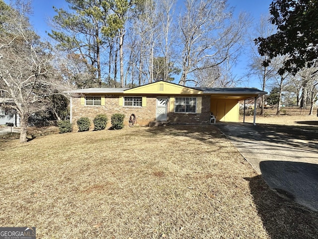 ranch-style house with a front lawn and a carport