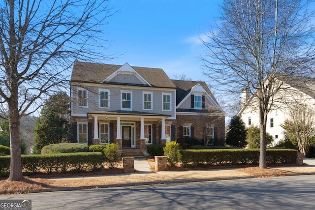 view of front of property featuring covered porch