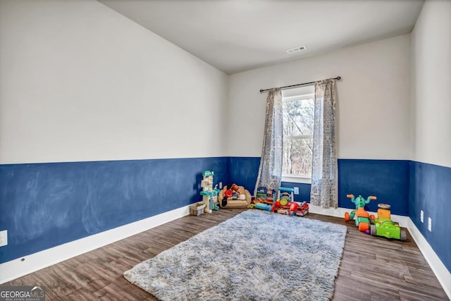 playroom with hardwood / wood-style floors