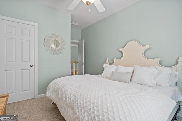 carpeted bedroom featuring ceiling fan