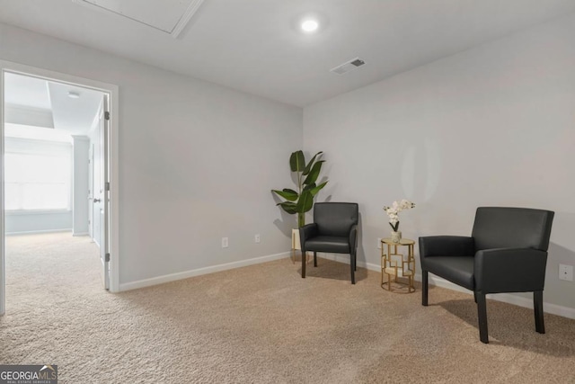 sitting room with light carpet