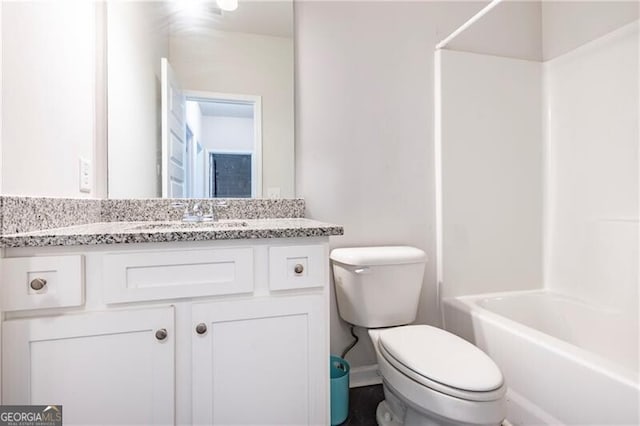 full bathroom featuring vanity, shower / bathing tub combination, and toilet