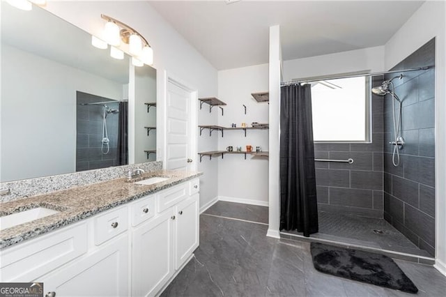 bathroom featuring vanity and a shower with shower curtain