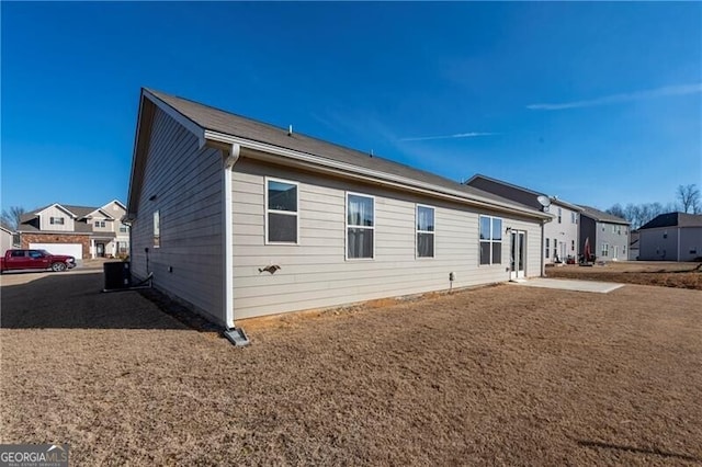 back of house with a patio area