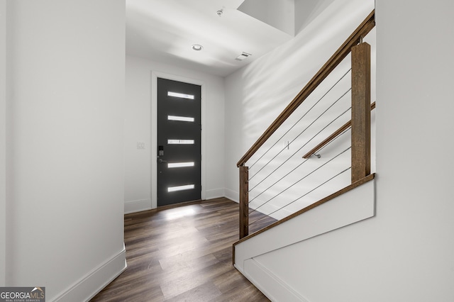 entrance foyer featuring hardwood / wood-style flooring