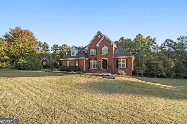 front of property featuring a front lawn