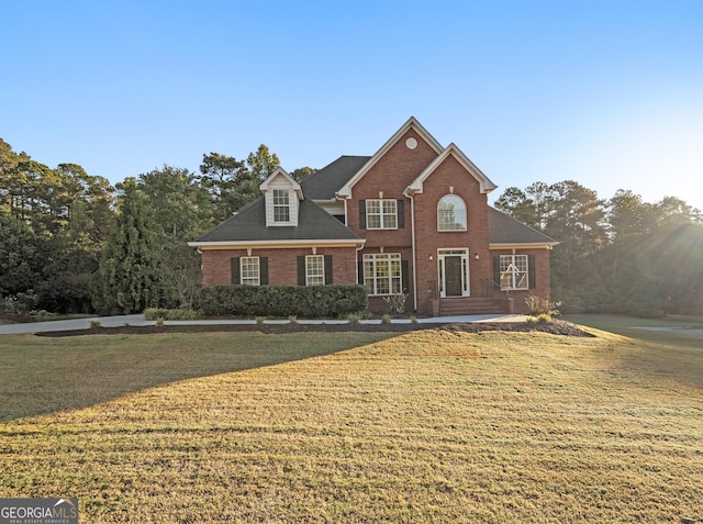 view of front property with a front lawn