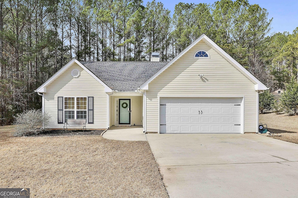 ranch-style house with a garage