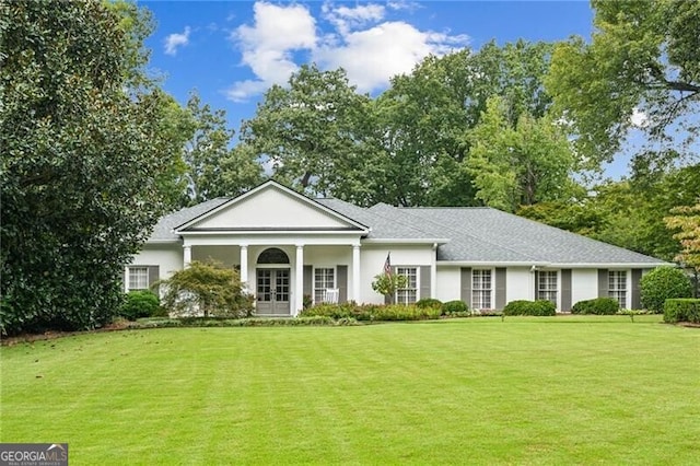 view of front of property with a front lawn