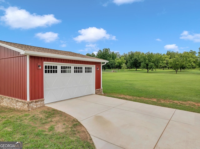 garage with a yard