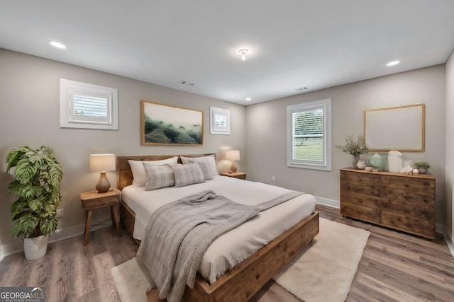 bedroom featuring hardwood / wood-style floors