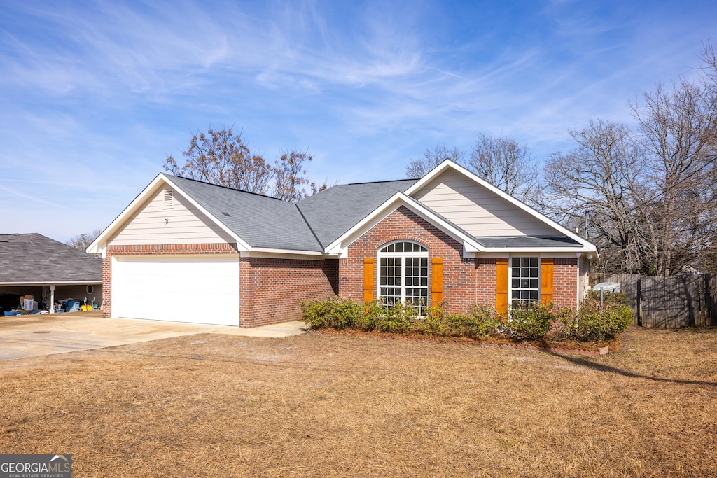 view of front of home featuring a garage