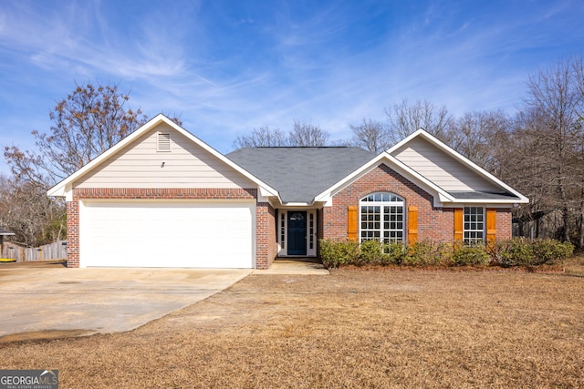 single story home featuring a garage