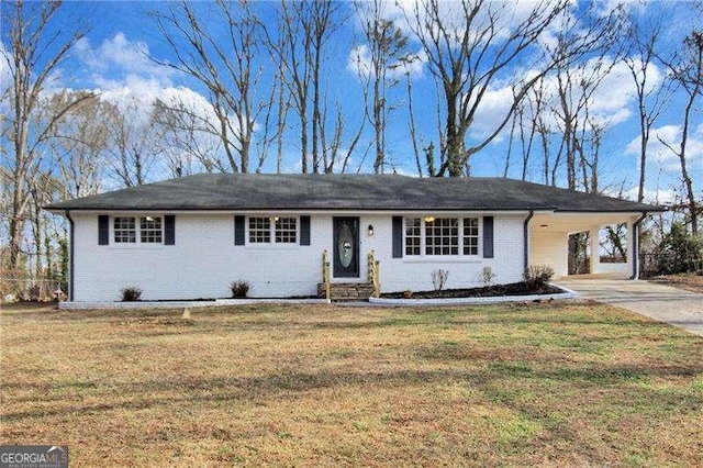 single story home with a carport and a front lawn