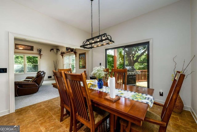 view of carpeted dining space