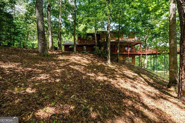 view of yard featuring a deck