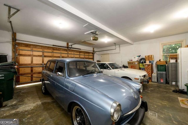 garage featuring a garage door opener