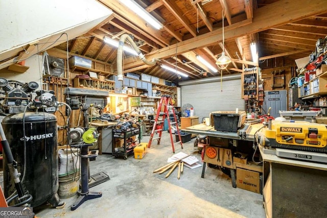 garage featuring a workshop area