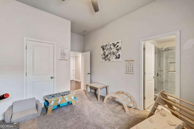 recreation room featuring carpet floors and ceiling fan