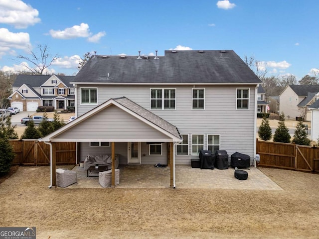 back of property with a patio area