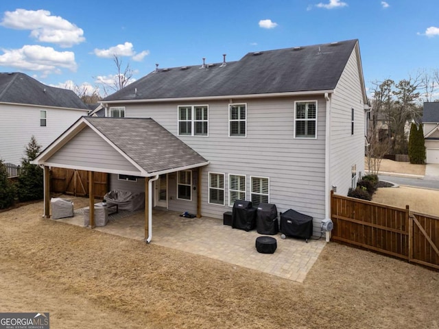 rear view of house with a patio area