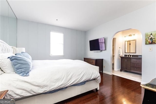 bedroom featuring dark wood-type flooring