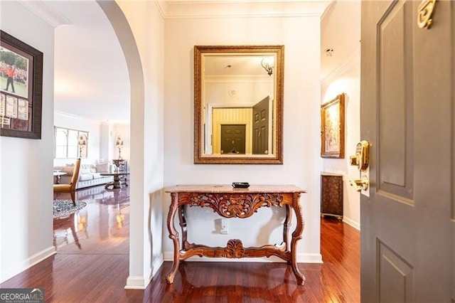 hall featuring hardwood / wood-style flooring and ornamental molding