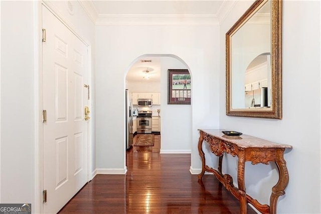 corridor featuring ornamental molding and dark hardwood / wood-style floors