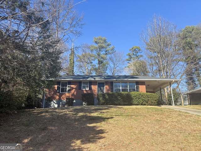 single story home featuring a carport and a front yard