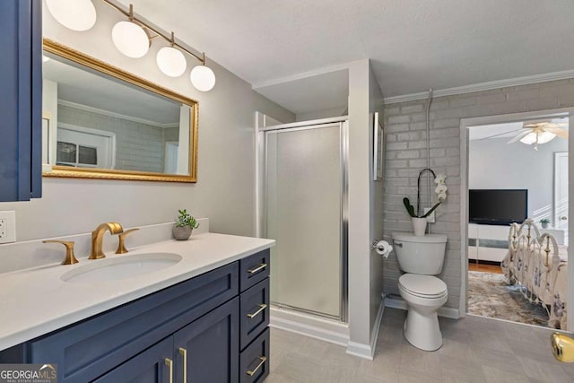 bathroom with vanity, ornamental molding, an enclosed shower, toilet, and a textured ceiling