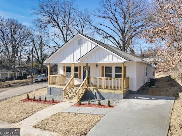 view of front of property featuring central AC and a porch