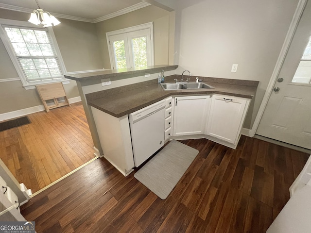 kitchen featuring sink, dishwasher, dark hardwood / wood-style floors, white cabinets, and kitchen peninsula