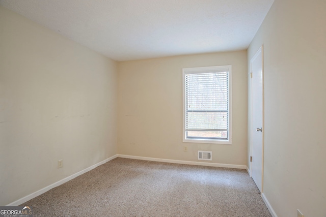 empty room with light carpet