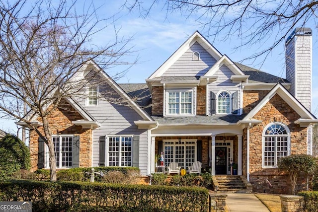 view of front of property featuring covered porch