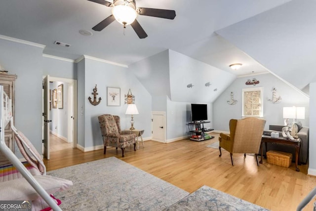 living room with crown molding, vaulted ceiling, hardwood / wood-style floors, and ceiling fan