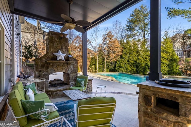 view of patio / terrace featuring an outdoor stone fireplace