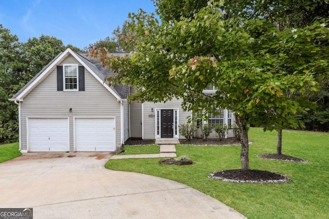 view of front facade featuring a garage and a front lawn