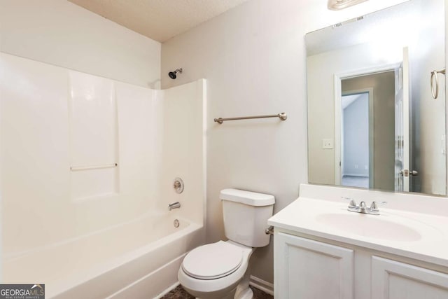 full bathroom with vanity, a textured ceiling, shower / bathtub combination, and toilet