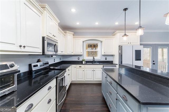 4801 Daniel Mill Rd, Winston, GA 30187 - kitchen featuring a toaster, appliances with stainless steel finishes, crown molding, and a sink