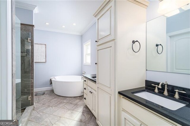 4801 Daniel Mill Rd, Winston, GA 30187 - bathroom with crown molding, a shower stall, a soaking tub, and vanity