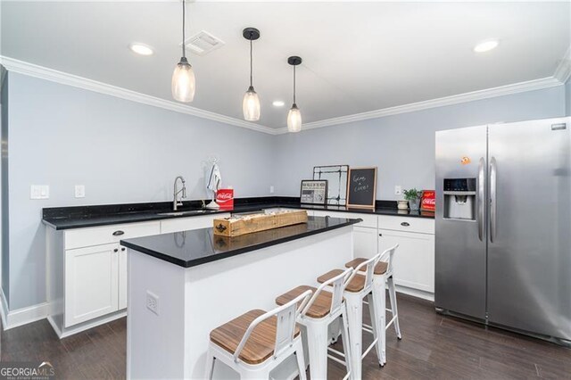 4801 Daniel Mill Rd, Winston, GA 30187 - kitchen with dark countertops, stainless steel refrigerator with ice dispenser, visible vents, and a sink