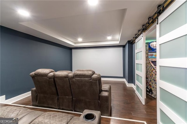 4801 Daniel Mill Rd, Winston, GA 30187 - home theater featuring recessed lighting, wood finished floors, a barn door, baseboards, and a raised ceiling